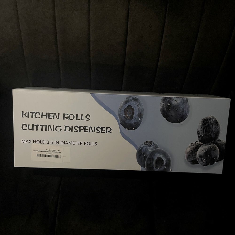 Kitchen rolls cutting dispenser.